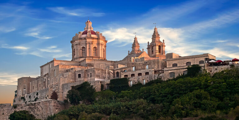 Wispy clouds play over the skyline of Mdina in late afternoon.