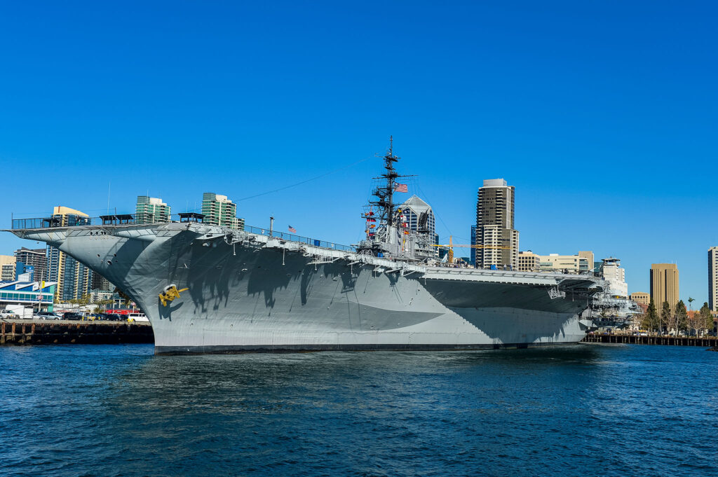 The gray hulk of the USS Midway sits in the water at Navy Pier.